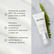 Tuba krému Advanced Day Eye Protect leží na mramorovom povrchu vedľa zeleného listu paprade. Text zdôrazňuje ochranu SPF 30, prevenciu viditeľných známok starnutia a schopnosť rozjasniť očné okolie a zmierniť opuchy.
