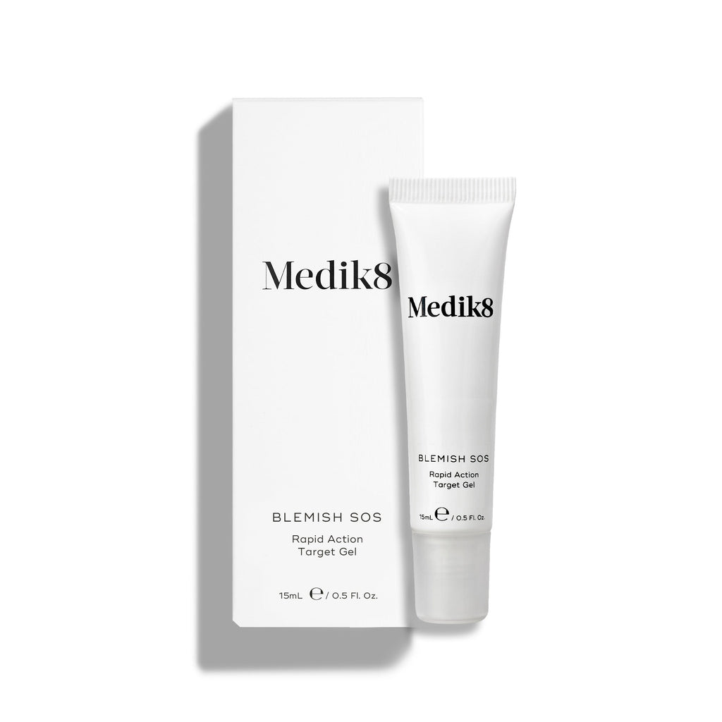 Biela tuba Blemish SOS (15 ml) stojí vedľa svojej bielej kartónovej škatuľky.
