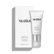 Biela tuba očného krému Eyelift Peptides stojí vzpriamene vedľa svojej bielej papierovej krabičky.